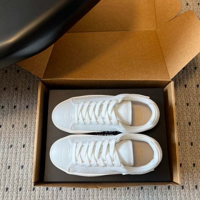 PRADA 26S LACE UP SNEAKERS 40MM IN WHITE CALFSKIN