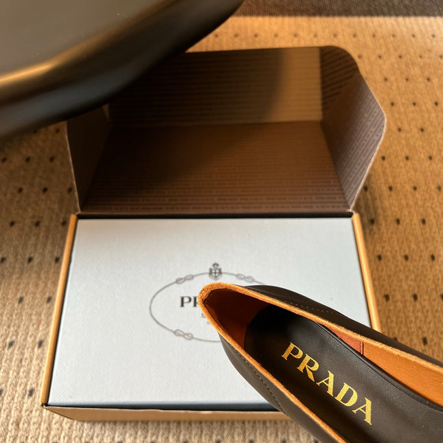 PRADA 26S POINTED TOE BOW FRINGE PUMPS 50MM IN BLACK CALFSKIN