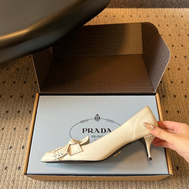 PRADA 26S POINTED TOE BOW FRINGE PUMPS 50MM IN IVORY WHITE CALFSKIN