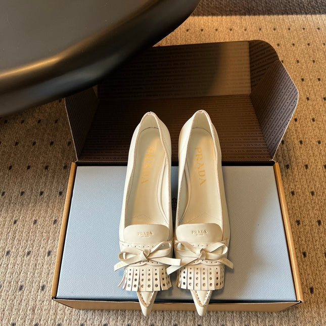 PRADA 26S POINTED TOE BOW FRINGE PUMPS 50MM IN IVORY WHITE CALFSKIN