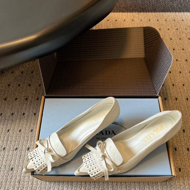 PRADA 26S POINTED TOE BOW FRINGE PUMPS 50MM IN IVORY WHITE CALFSKIN