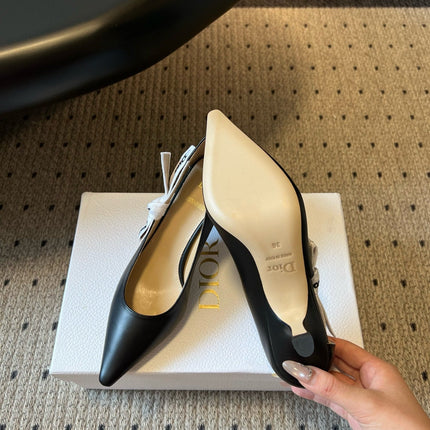 DIOR 26S POINTED-TOE PUMPS 65MM IN BLACK CALFSKIN WITH J'ADIOR BOW