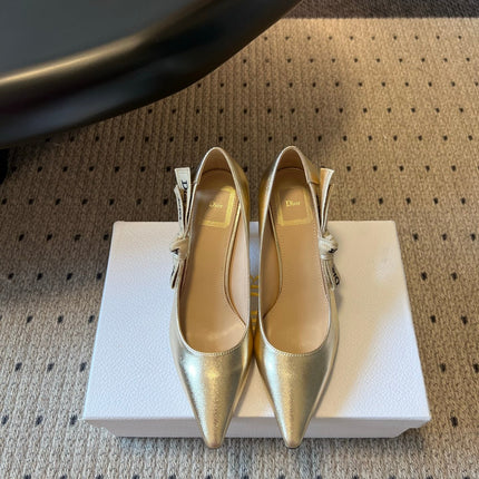 DIOR 26S POINTED-TOE PUMPS 65MM IN GOLD CALFSKIN WITH J'ADIOR BOW
