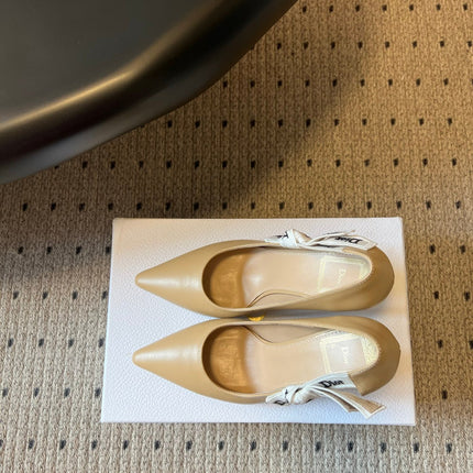 DIOR 26S POINTED-TOE PUMPS 95MM IN BEIGE CALFSKIN WITH J'ADIOR BOW