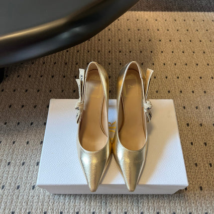 DIOR 26S POINTED-TOE PUMPS 95MM IN GOLD CALFSKIN WITH J'ADIOR BOW