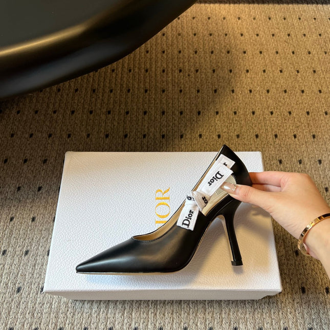 DIOR 26S POINTED-TOE PUMPS 95MM IN BLACK CALFSKIN WITH J'ADIOR BOW