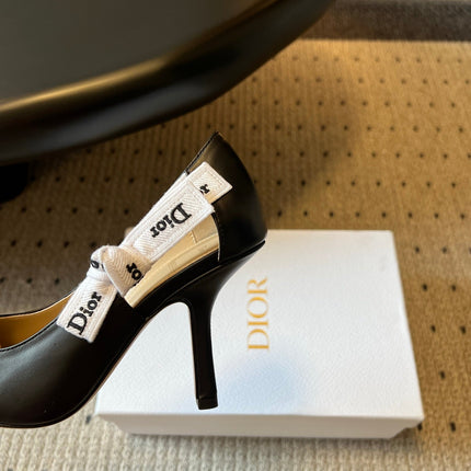 DIOR 26S POINTED-TOE PUMPS 95MM IN BLACK CALFSKIN WITH J'ADIOR BOW