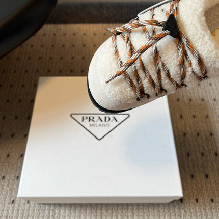 PRADA 26S WOVEN MULES IN IVORY SUEDE AND WOOL