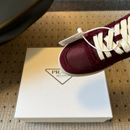 PRADA 26S PLATFORM SNEAKERS IN DARK RED FABRIC MIX SUEDE