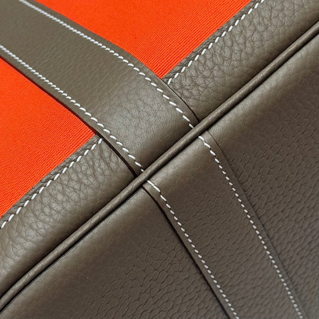 GARDEN PARTY 30CM IN ORANGE MINIMUM TOILETS COTTON CANVAS AND BROWN CALFSKIN