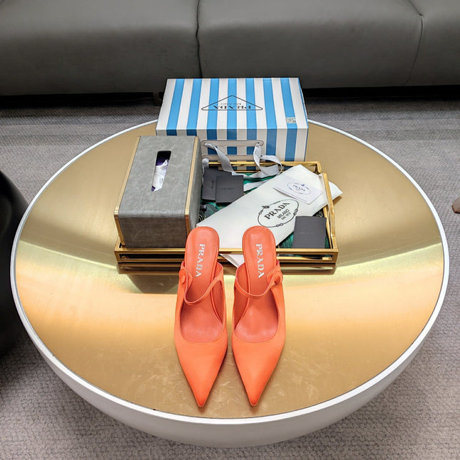 PRADA 26S HIGH-HEELED MULES 85MM IN ORANGE SATIN