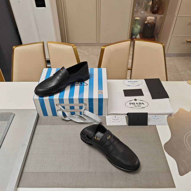 PRADA 26S LOAFERS 20MM IN BLACK CALFSKIN