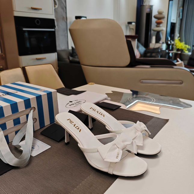 PRADA 26S HEEL MULE SANDALS 75MM IN WHITE CALFSKIN WITH BOW
