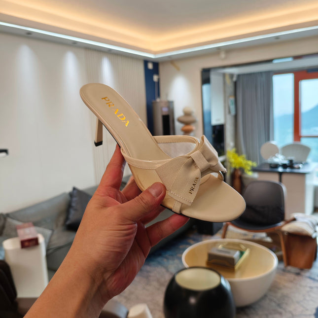 PRADA 26S HEEL MULE SANDALS 75MM IN IVORY WHITE CALFSKIN WITH BOW