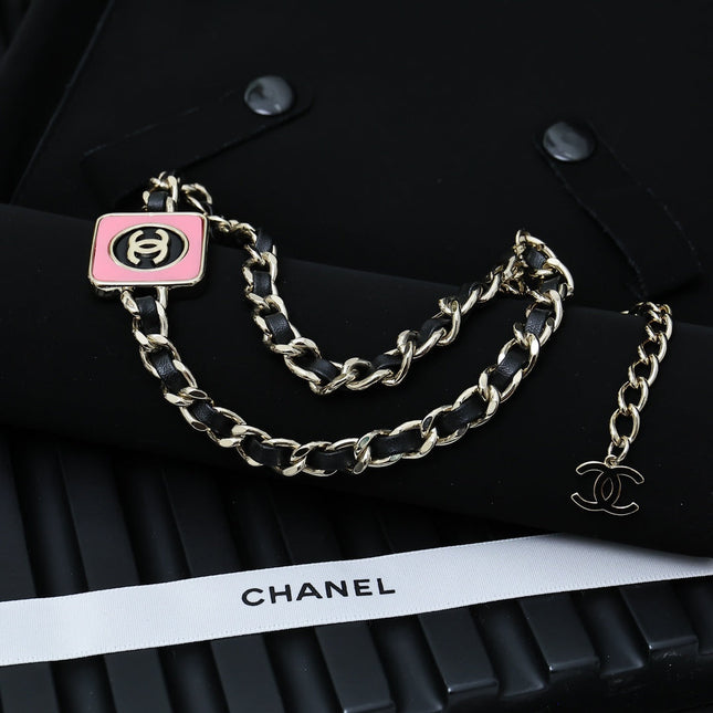 CHAIN CHOKER IN GOLD-PLATED METAL WITH  LEATHER THROUGH LINKS