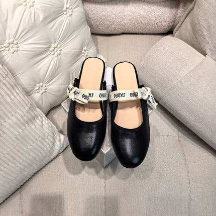 DIOR 26S FLAT MULES IN BLACK CALFSKIN WITH J'ADIOR BOW