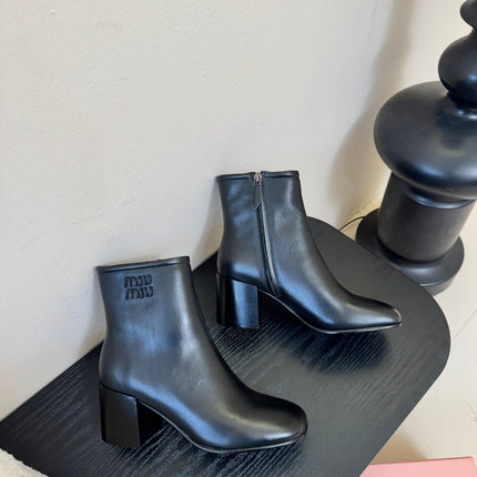 MIUMIU 25S ANKLE BOOTS 65MM IN BLACK CALFSKIN