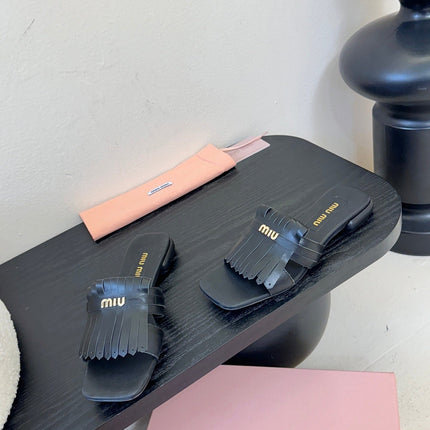 MIUMIU 26S FLAT SLIPPERS IN BLACK CALFSKIN