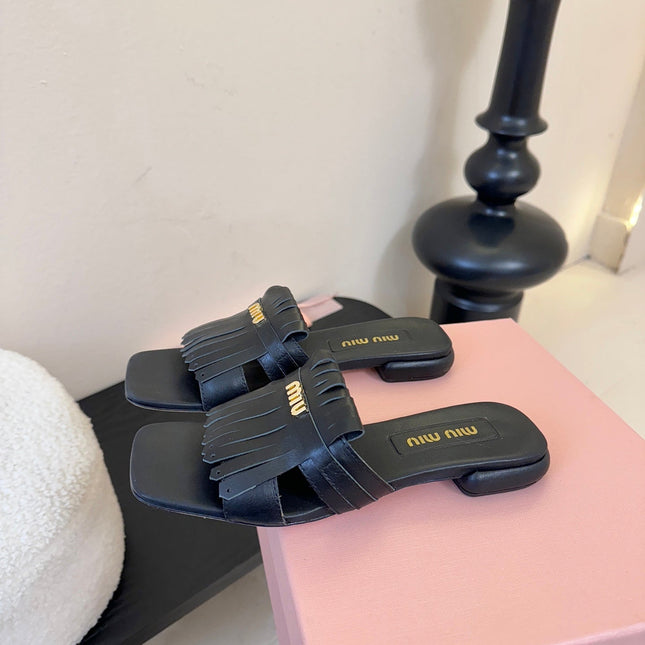 MIUMIU 26S FLAT SLIPPERS IN BLACK CALFSKIN