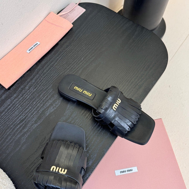 MIUMIU 26S FLAT SLIPPERS IN BLACK CALFSKIN