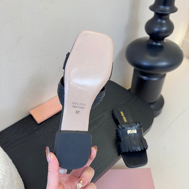 MIUMIU 26S FLAT SLIPPERS IN BLACK CALFSKIN