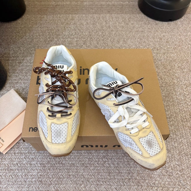 MIUMIU 26S PERFORATED SNEAKERS IN WHITE AND BEIGE YELLOW CALFSKIN