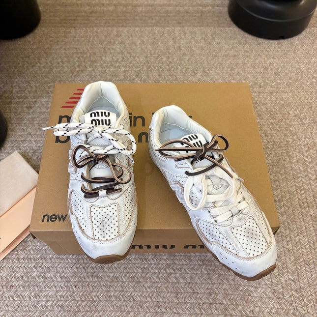 MIUMIU 26S PERFORATED SNEAKERS IN CREAM WHITE CALFSKIN