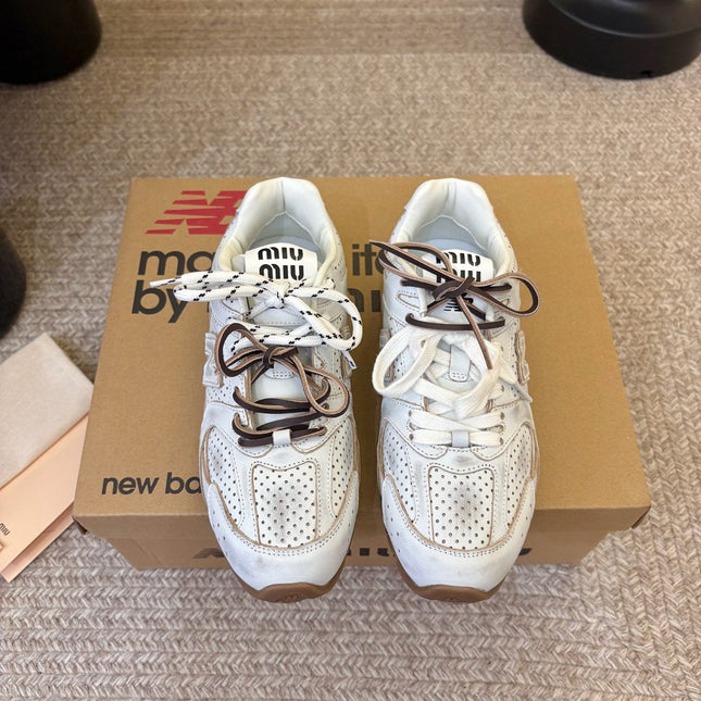 MIUMIU 26S PERFORATED SNEAKERS IN CREAM WHITE CALFSKIN