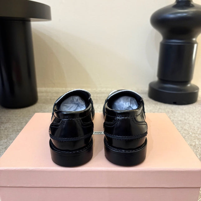 MIUMIU 26S COIN PENNY LOAFERS IN BLACK MIX WHITE CALFSKIN