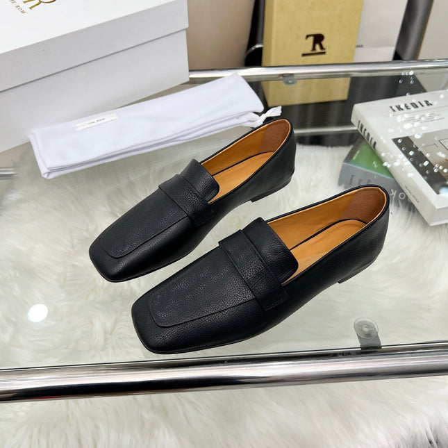 THE ROW 26S PENNY LOAFER FLATS IN BLACK GRAINED CALFSKIN