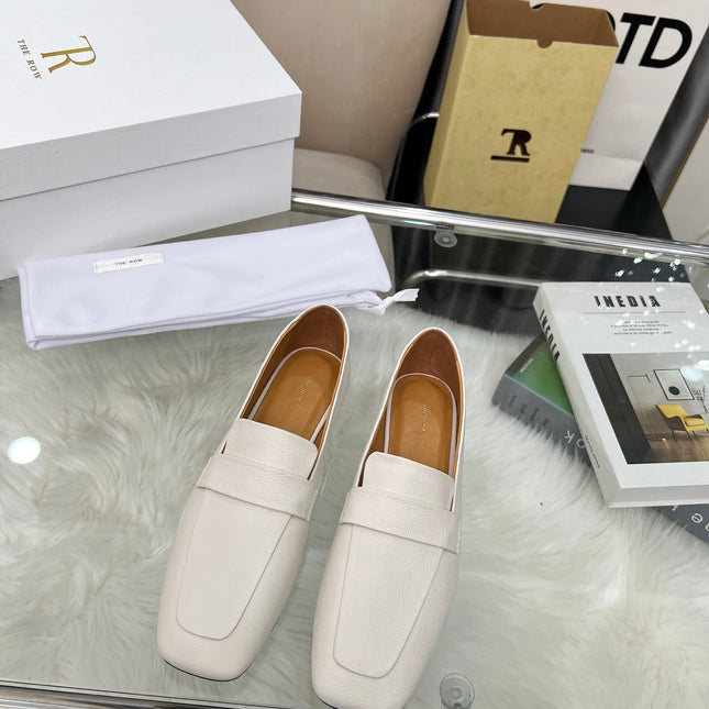 THE ROW 26S PENNY LOAFER FLATS IN IVORY WHITE GRAINED CALFSKIN