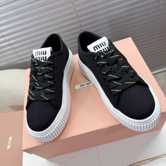 MIUMIU 26S PLATFORM SNEAKERS IN BLACK CANVAS