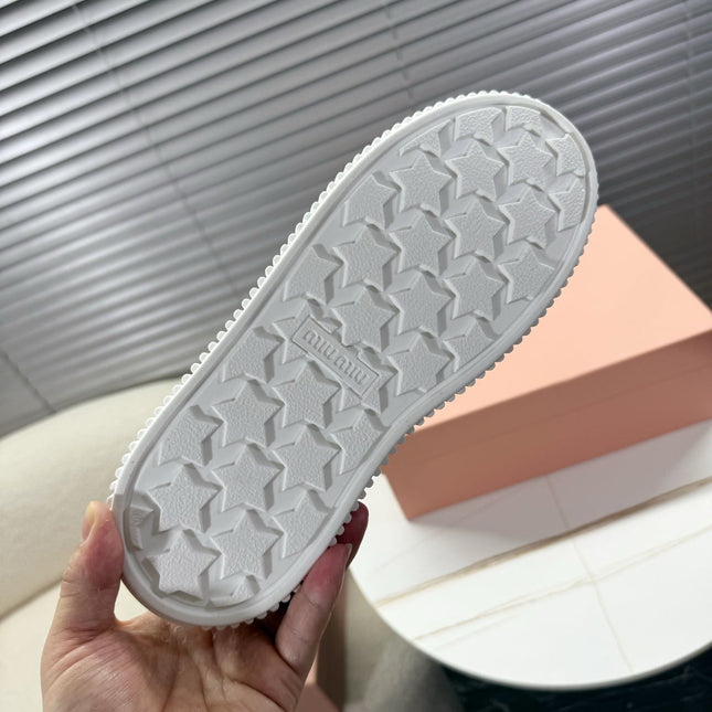 MIUMIU 26S PLATFORM SNEAKERS IN BLACK CANVAS