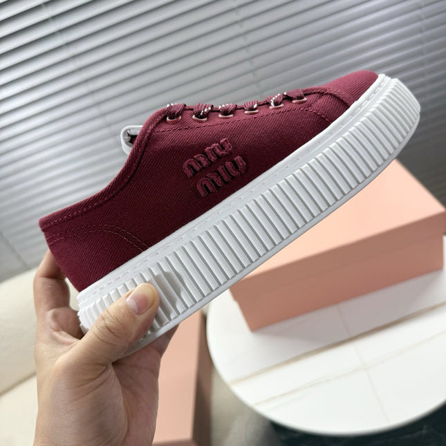 MIUMIU 26S PLATFORM SNEAKERS IN DARK RED CANVAS