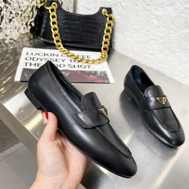 PRADA 26S CLASSIC LOAFERS IN BLACK CALFSKIN WITH LOGO