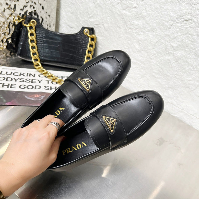 PRADA 26S CLASSIC LOAFERS IN BLACK CALFSKIN WITH LOGO