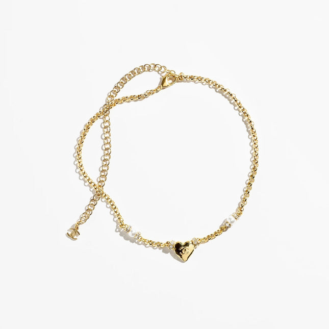 CHANEL 26S DOUBLE C LOGO PEARL & HEART CHARM NECKLACE IN GOLD METAL 631004