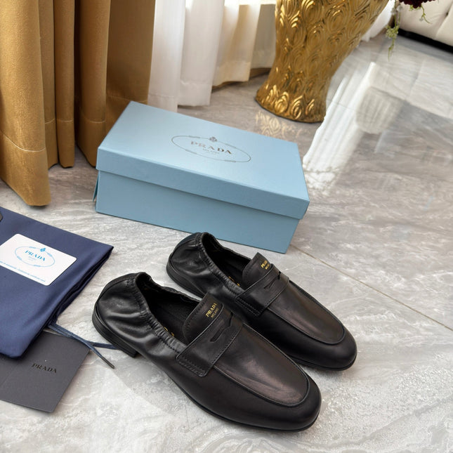 PRADA 25S LOAFERS IN BLACK CALFSKIN
