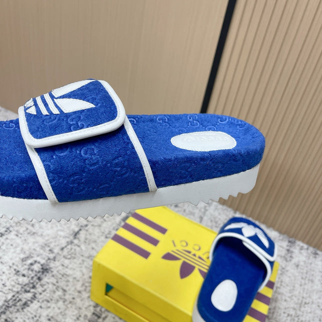 GUCCI 26S PLATFORM SLIDE SANDALS IN DARK BLUE FABRIC