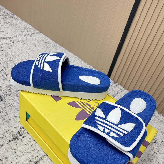 GUCCI 26S PLATFORM SLIDE SANDALS IN DARK BLUE FABRIC