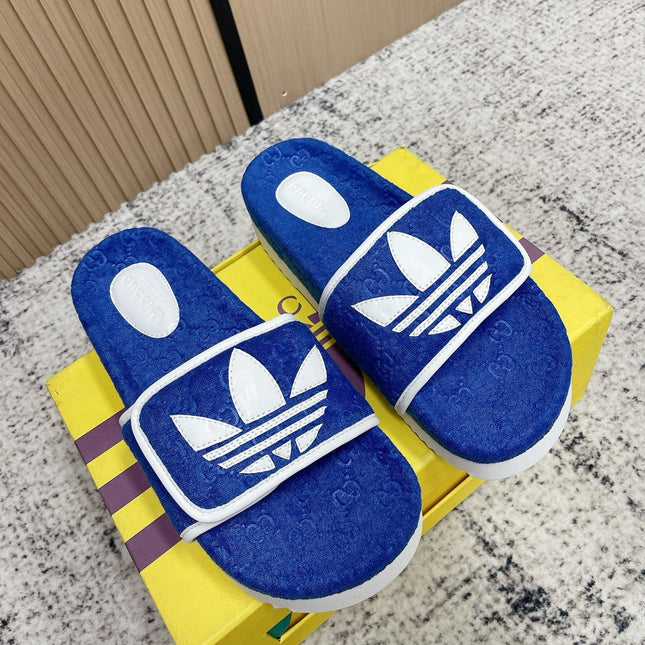 GUCCI 26S PLATFORM SLIDE SANDALS IN DARK BLUE FABRIC