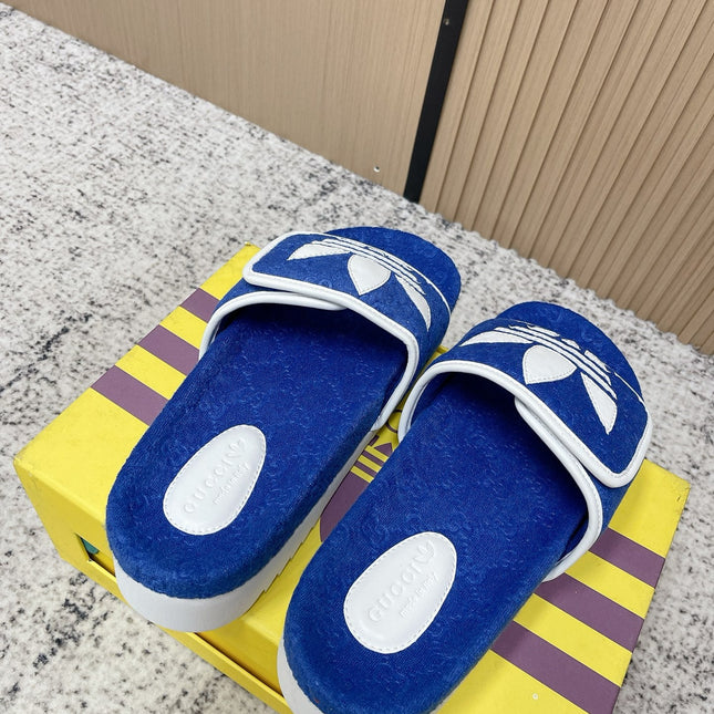 GUCCI 26S PLATFORM SLIDE SANDALS IN DARK BLUE FABRIC