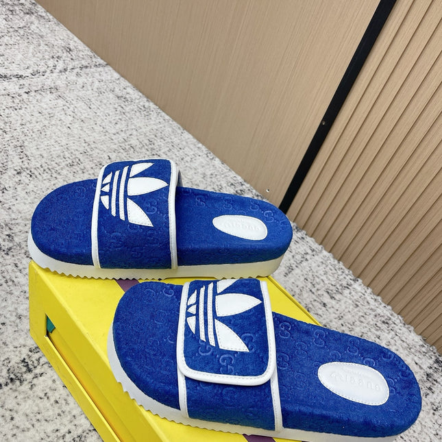 GUCCI 26S PLATFORM SLIDE SANDALS IN DARK BLUE FABRIC