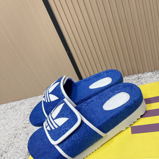 GUCCI 26S PLATFORM SLIDE SANDALS IN DARK BLUE FABRIC