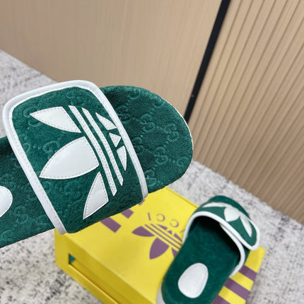 GUCCI 26S PLATFORM SLIDE SANDALS IN GREEN FABRIC