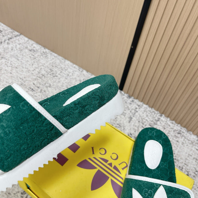 GUCCI 26S PLATFORM SLIDE SANDALS IN GREEN FABRIC