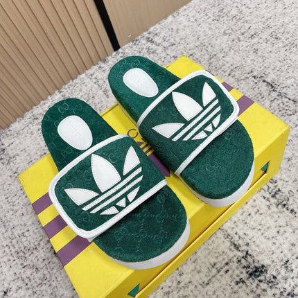 GUCCI 26S PLATFORM SLIDE SANDALS IN GREEN FABRIC