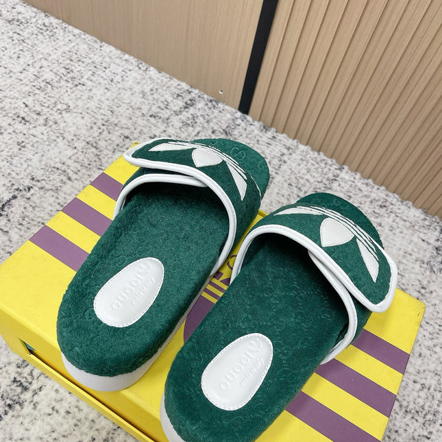 GUCCI 26S PLATFORM SLIDE SANDALS IN GREEN FABRIC