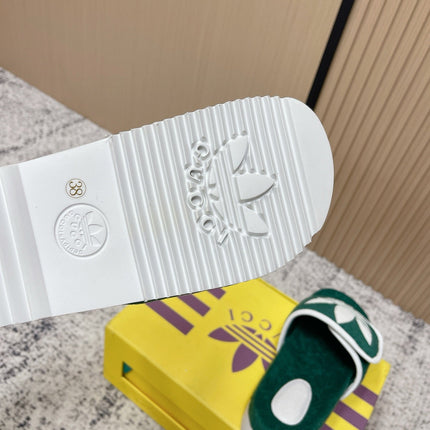 GUCCI 26S PLATFORM SLIDE SANDALS IN GREEN FABRIC