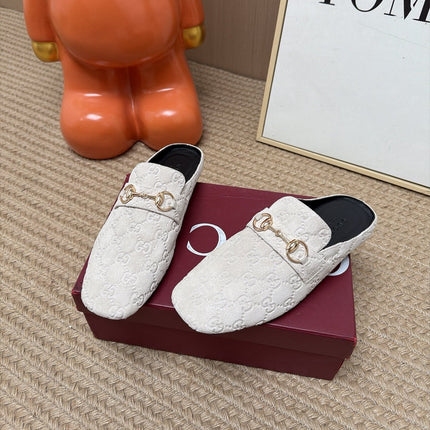 GUCCI 26S FLAT MULES IN OFF WHITE GG EMBOSSED SUEDE